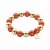 biba Armband aus magisch schimmernden Perlen 12 mm - Orange/Gold